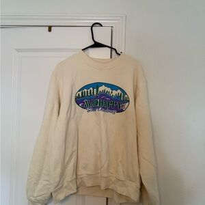 Madhappy Cream Sweatshirt with Vibrant Graphic